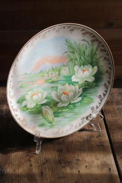 browned stained old antique china charger plate w/ water lily flowers, pond lilies