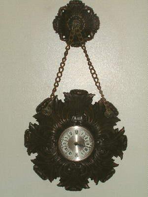 burwood plastic wall clock w/ hanging medallion