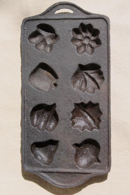 cast iron maple sugar mold for making tiny leaves, acorns, pumpkins, fall fruit