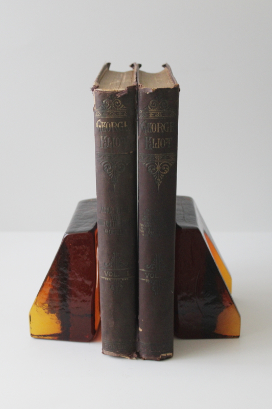 chunky amber glass bookends, mod vintage Wayne Husted Blenko glass arched wedge shape