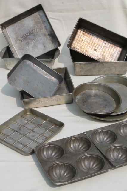 collection of vintage cake pans, pie plates & bread loaf baking
