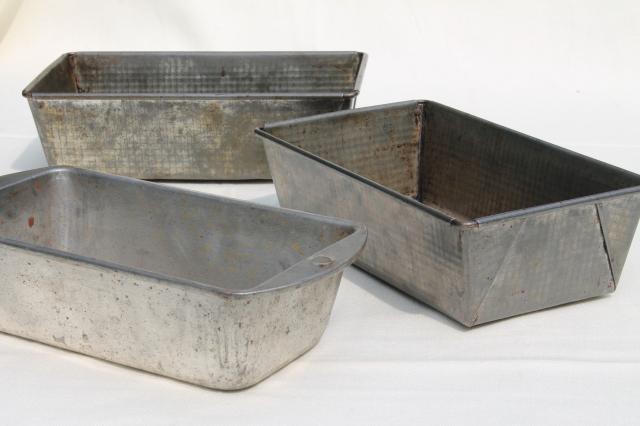 collection of vintage cake pans, pie plates & bread loaf baking tins w/  nice old patina