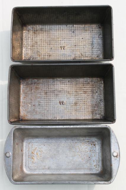 collection of vintage cake pans, pie plates & bread loaf baking tins w/  nice old patina