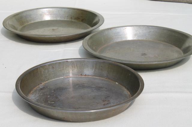 collection of vintage cake pans, pie plates & bread loaf baking tins w/  nice old patina