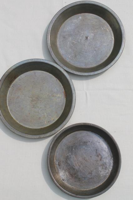 collection of vintage cake pans, pie plates & bread loaf baking tins w/  nice old patina