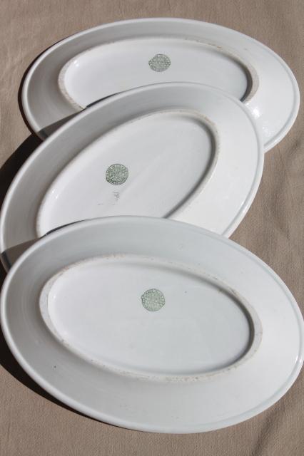 collection of vintage white ironstone china platters / restaurant ware steak plates