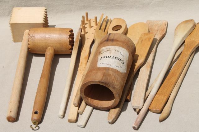 collection of vintage wooden kitchen utensils, wood spoons, meat tenderizer mallets