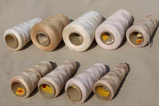 creamy white antique colors primitive grubby old spools of vintage cotton cord thread