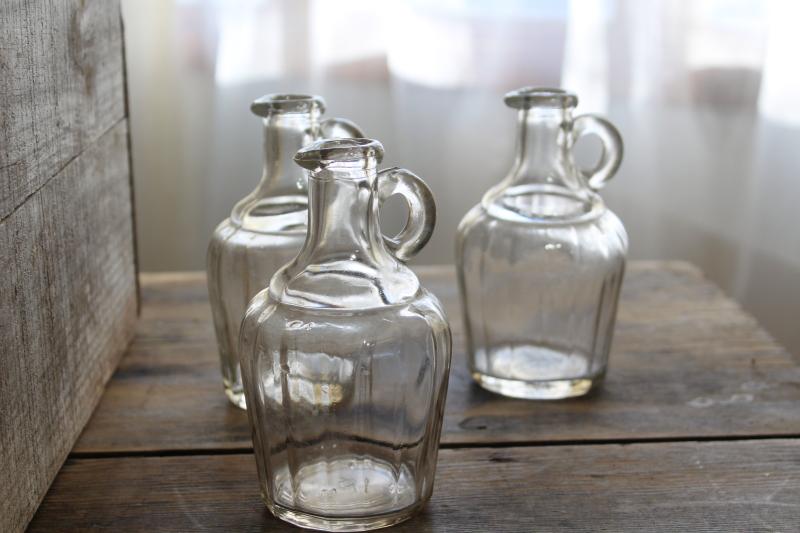 early 1900s vintage maple syrup bottles, jug shape pressed glass pitchers