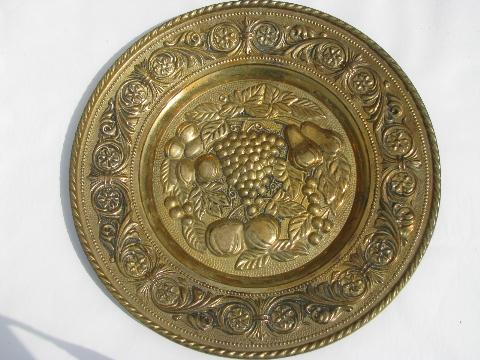 embossed solid brass chargers, large plates or trays, fruit patterns
