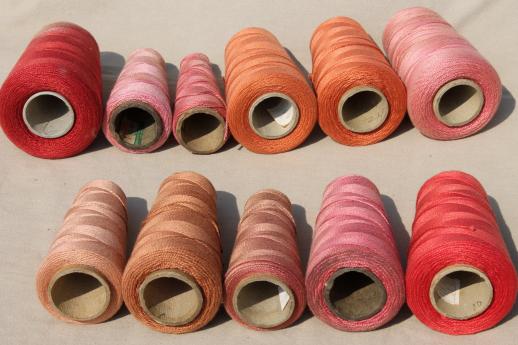 faded reds, barn red colors primitive grubby old spools of vintage cotton cord thread