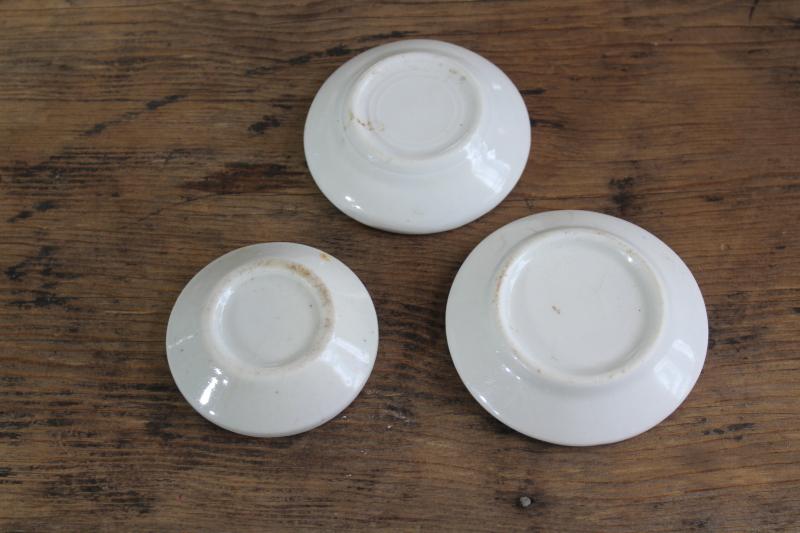 farmhouse vintage butter pats, stack of tiny plates heavy white ironstone china dishes