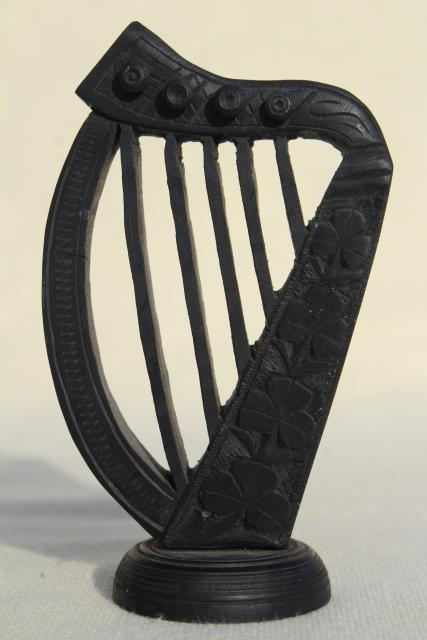 hand carved wooden Irish harps, vintage souvenirs of Ireland, dark peat color wood carvings