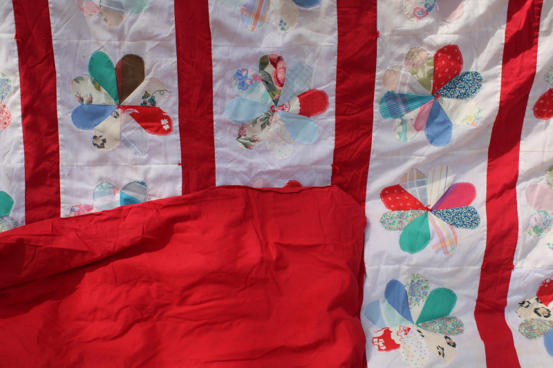 handmade machine sewn vintage quilt, colorful prints retro daisy flowers w/ red border