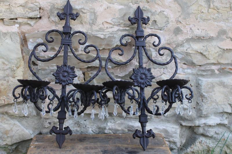heavy cast iron wall sconces, French country fleur de lis architectural decor