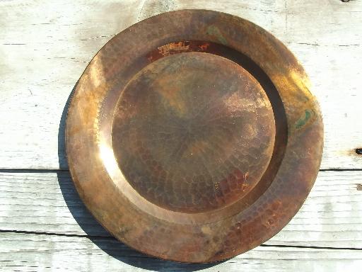 heavy solid copper charger plates or trays, hand hammered and burnished