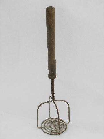 https://laurelleaffarm.com/item-photos/huge-vintage-wirework-masher-old-wood-handle-for-potatoes-or-laundry-Laurel-Leaf-Farm-item-no-b215126-1.jpg