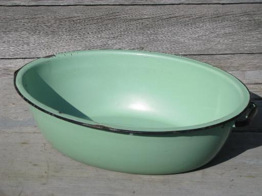jadite green vintage enamelware, big old primitive wash tub, oval dish pan