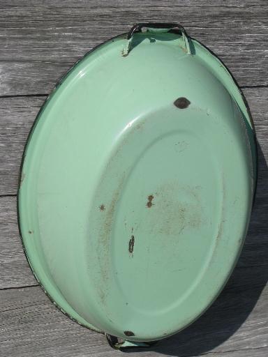 jadite green vintage enamelware, big old primitive wash tub, oval dish pan