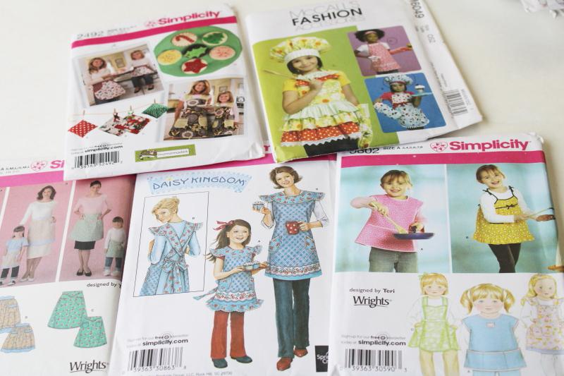 large lot out of print sewing patterns, all aprons for children or mommy & me