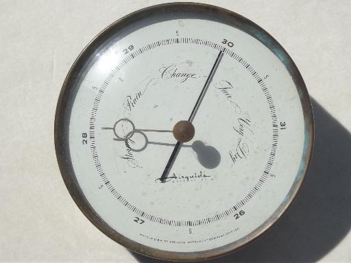 large old brass Airguide barometer, vintage barometer looks rough but works