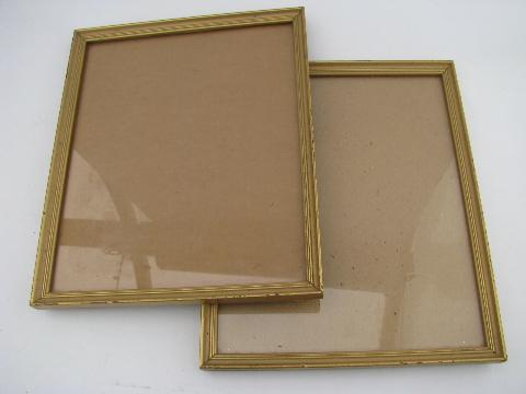 lot antique and vintage wood picture frames, some old prints