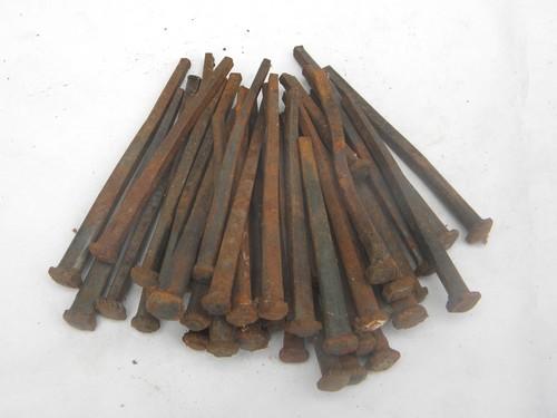 lot large primitive old rusty square cut nails w/forged rose heads