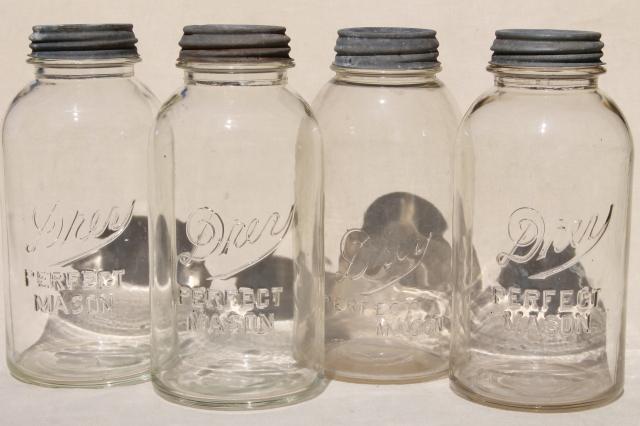 lot of 4 vintage two quart Mason jars w/ antique zinc metal lids