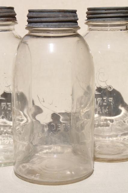 lot of 4 vintage two quart Mason jars w/ antique zinc metal lids