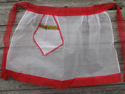 lot of 8 vintage red and green holiday aprons, Christmas prints etc.