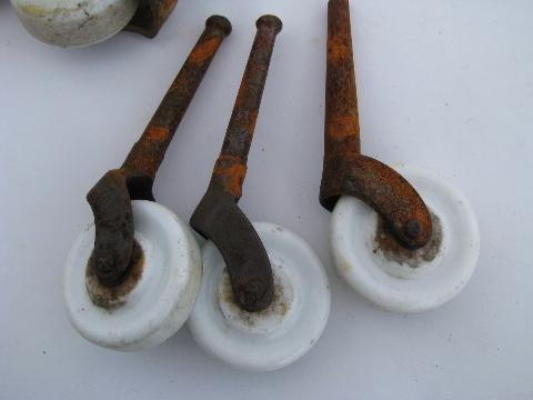 lot of antique furniture casters with white ironstone porcelain wheels