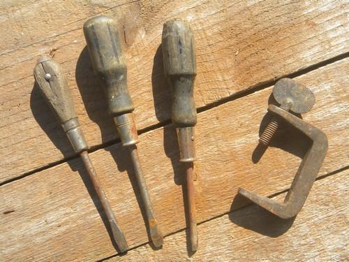 lot of assorted primitive old tools saw setter, tubing clamp tool etc