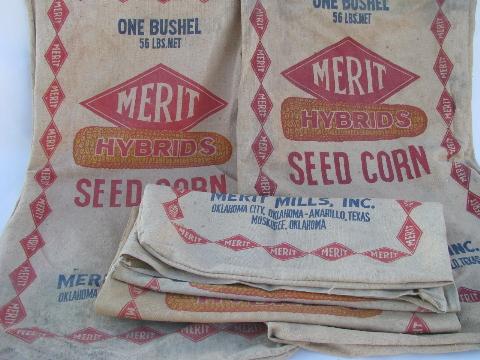 lot of old Merit advertising seed corn bags, vintage cotton sacks