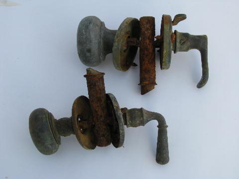 lot of old antique brass door knobs and handles, vintage architectural restoration hardware