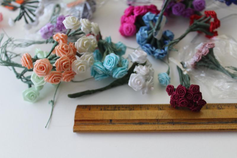 lot of vintage flower picks, tiny ribbon roses on florists wire, craft flowers