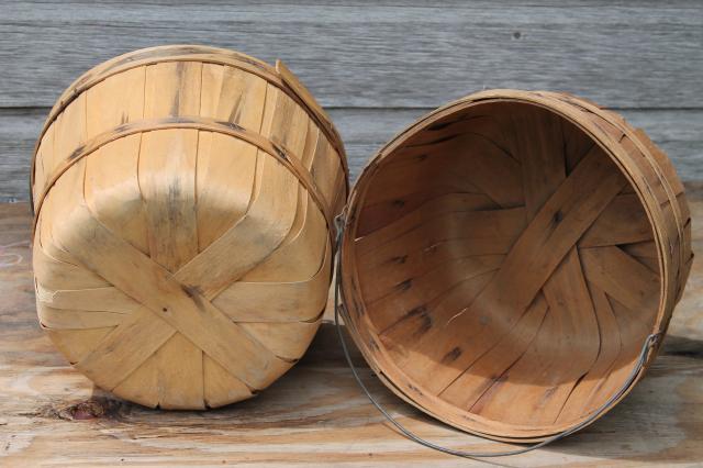 lot old farmer's market wood baskets for orchard or farm garden stand produce, shop displays 