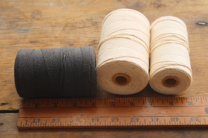 lot vintage black  natural white cotton string or package tying cord, big old spools of heavy cotton thread