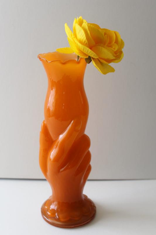 mid century mod vintage hand holding trumpet vase, cased glass in orange