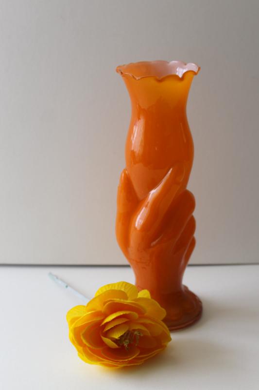 mid century mod vintage hand holding trumpet vase, cased glass in orange