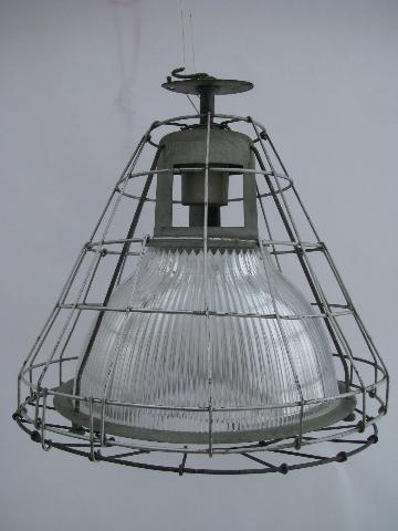 mid-century industrial machine-age vintage Holophane ceiling light with glass shade and wire cage
