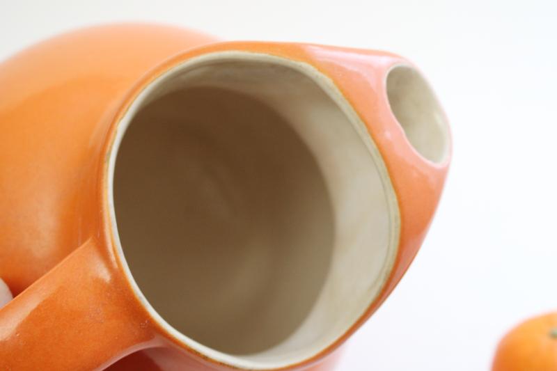 mid-century mod vintage pottery pitcher, round ball jug orange ceramic