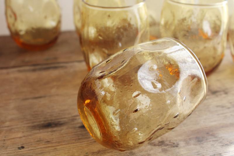 mid-century mod vintage textured amber glass roly poly glasses, pinch shape thumbprint tumblers