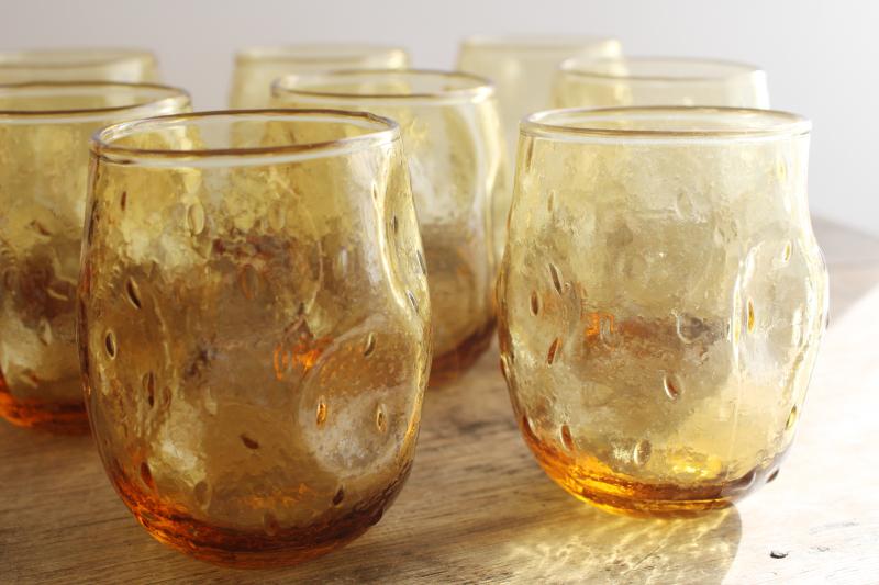 mid-century mod vintage textured amber glass roly poly glasses, pinch shape thumbprint tumblers