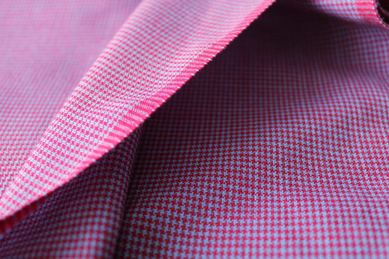 mini houndstooth check suiting fabric, deep red and grey blue poly blend material