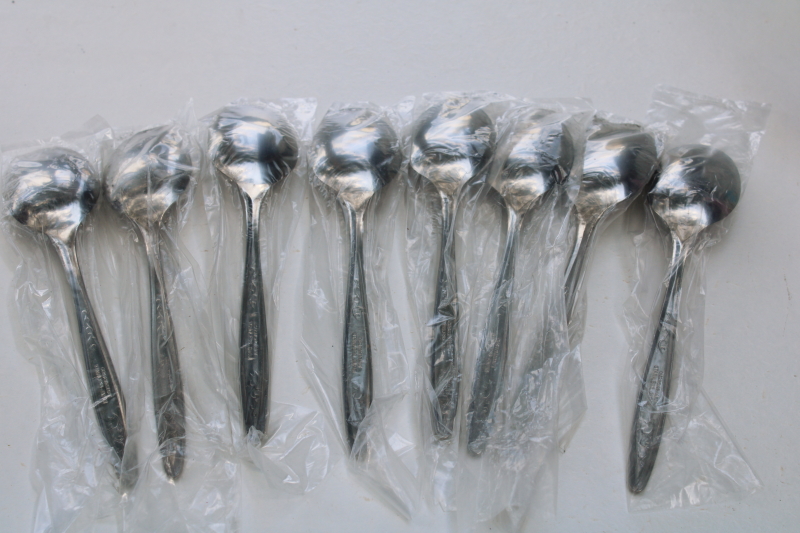mint in original package 70s vintage Customcraft stainless soup spoons set of 8, mod floral pattern