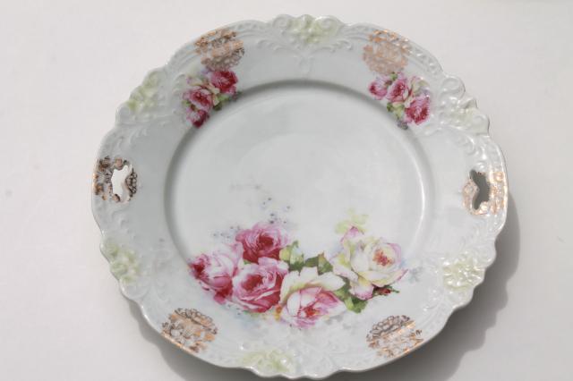 mismatched vintage china, antique plates w/ shabby roses & floral bouquets
