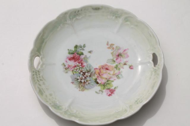 mismatched vintage china, antique plates w/ shabby roses & floral bouquets