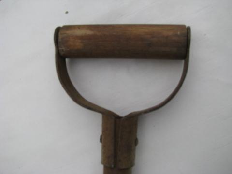 old 1930s vintage steel snow shovel, primitive farm tool