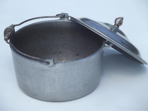 old Majestic cast aluminum dutch oven w/ spun wire handles for wood stove