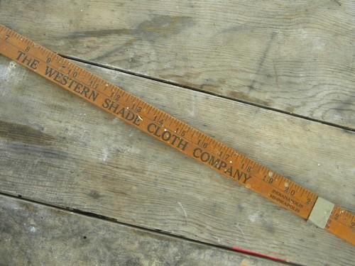 old adjustable advertising ruler for measuring window opening for shades